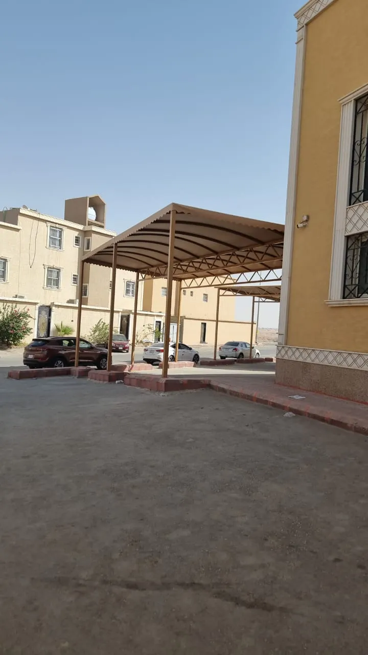 تركيب مظلات مشاريع مواقف سيارات في حي المحاميد 