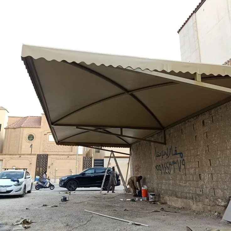 تركيب مظلات سيارات مقص ومداخل منازل جدة